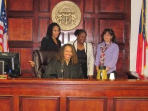 Stephanie Curtis, Denise Lofton and Betsy Mitchell were sworn in as CASA volunteers on Dec. 7. Photo provided. 