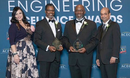 CERM is presented with the ACEC 2018 National Recognition Award during the Engineering Excellence Awards Gala in April in Washington, D.C. Pictured from left to right: Judy Hricak, Engineering Excellence Award Committee Chair; Kenneth Fluker, CERM’s Business Group Manager and Principal Engineer; Albert G. Edwards, CERM’s Founder and Managing Director; and Manish Kothari, ACEC Chairman Elect. 
