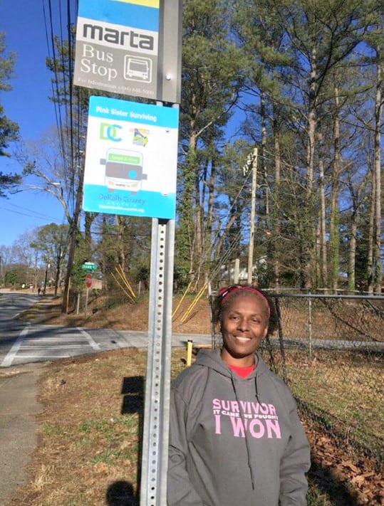 Priscilla Davenport stands by her adopted MARTA bus stop.