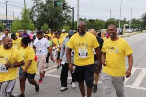 Founder of "I Am a Father" Walk/Run David Manuel and others enjoying the annual Father's Day 5K June 2016