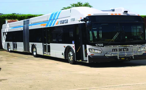 marta bus drags car