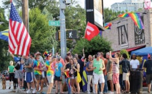 Orlando supporters rally at the intersection of 10th and Piedmont where many gathered one year ago to celebrate the U.S. Supreme Court's decision on marriage equality. Image Source: The GA Voice