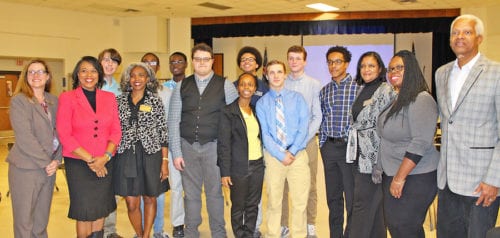 Pictured: Rockdale Magnet School for Science and Technology (RMSST) Director Dr. Debra Arnold, Rockdale County Board of Education (BOE) member Katrina Young, Austin Goodloe, BOE member Heather Duncan, Brandon Golston, Julaam Diop, Daniel Garner, RMSST teacher Dametria Williams (front), JC Hardnett, Jaxon Cowles, Jonas Woodruff, Cameron Bennett, BOE member Pam Brown, AT&T Senior Specialist LaTonya Peele, Congressman Hank Johnson. Image Source: Michelle Kim for Rockdale County School System