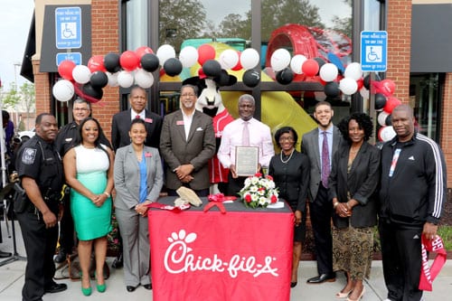 Community stakeholders celebrate the reopening on the Chick-fil-A restaurant on Turner Hill