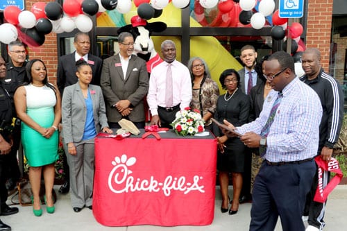 Community stakeholders gather for the reopening of the newly renovated Chick-fil-A on Turner Hill