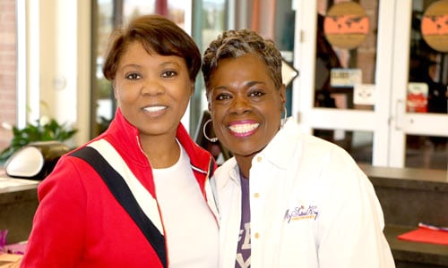 L-R: Pastor Billie Cox and Dr. Toni G. Alvarado pose for photos at the Feb. 3 empowerment conference, which was held at the Rockdale Career Academy. An estimated 200 girls from middle schools and high schools participated in the event. Photos by Glenn L. Morgan