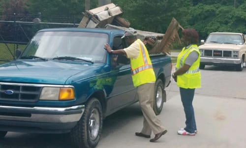 DeKalb CEO Michael Thurmond and Sanitation Division Director Tracy Hutchinson welcome DeKalb residents to “2nd Annual Landfill Amnesty Day.” Photo provided