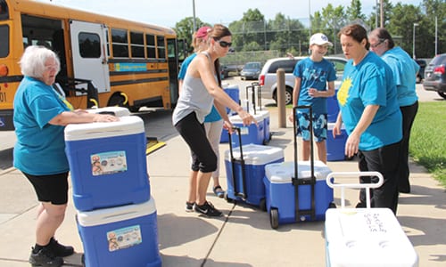 “Be Bright, Eat Right, Rockdale” free summer lunch delivery bus at the Nancy Guinn Memorial Library in Conyers every weekday at 11:15 a.m. through July 20. Photos by Michelle Kim, Rockdale County Public Schools 