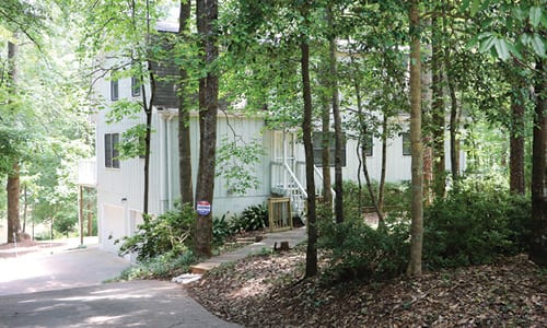 Ruth Johnson Floyd said the vacation rental on Panola Lakes Circle, pictured above, has created problems for neighbors. Photos by Glenn L. Morgan