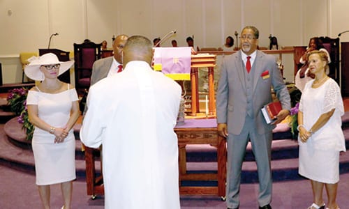 L-R: Angel Veasley and Deacon Reginald Veasley and Deacon Mayor Jason Lary and Debbie Lary are presented to the congregation. Photo by Glenn L. Morgan