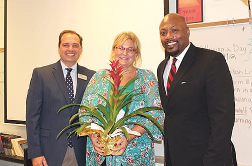 Amy Baxter (center) with RCHS Principal Frank Daniels (left) and Superintendent Dr. Terry Oatts. Photos provided