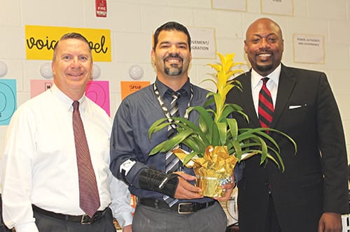 Carlos Hernandez (center) with DMS Principal Randy Goerner (left) and Superintendent Dr. Terry Oatts. 
