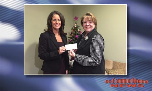 Judge Nancy Bills (left) presenting a check from the proceeds of the RAV 5K to Vickie Stevenson, Executive Director of Project ReNeWal. Photo provided