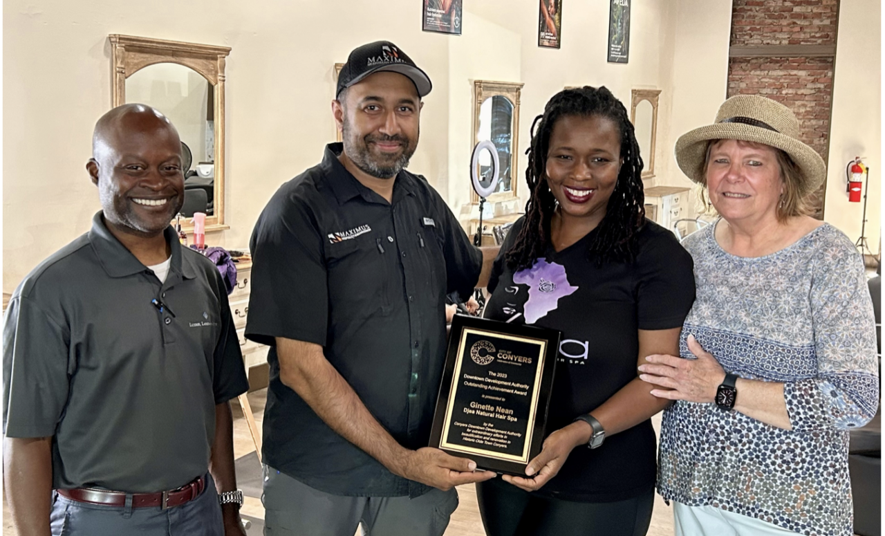Conyers DDA presents Outstanding Achievement Award to Djea Natural Hair Spa