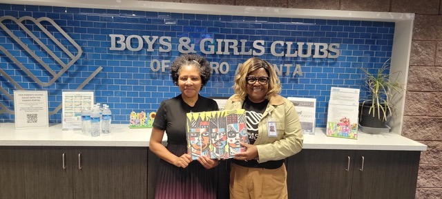 Director presented Mayor with a painting by Boys and Girls student (2)
