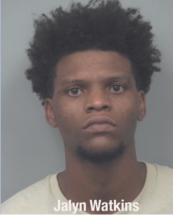 Man, 22, arrested after firing gun outside Buford business
